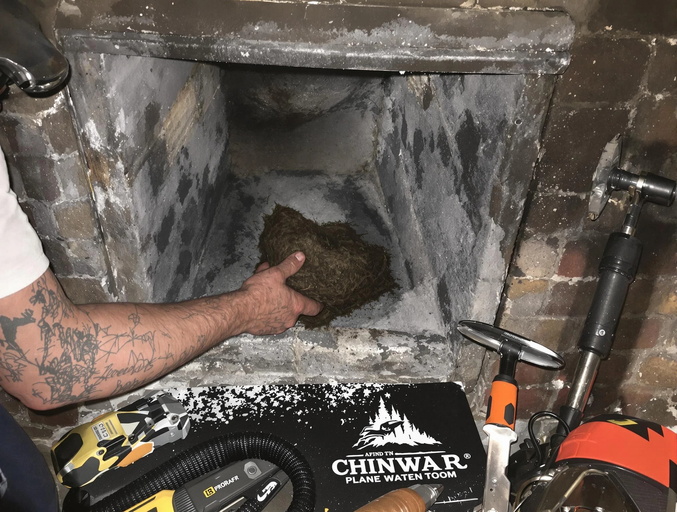 Queen Creek Chimney Sweep safely removing debris and screening chimney in Queen Creek, AZ