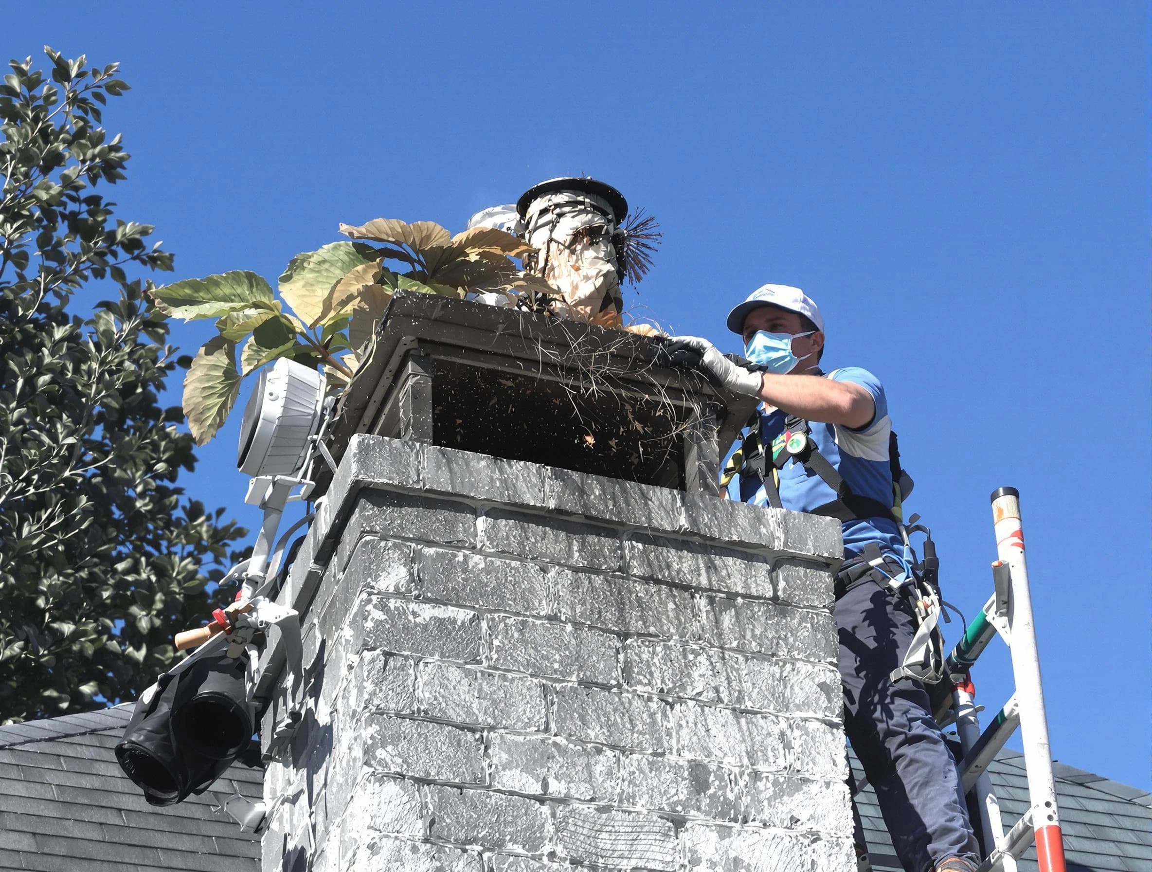 Queen Creek Chimney Sweep specialist performing chimney cleaning in Queen Creek, AZ