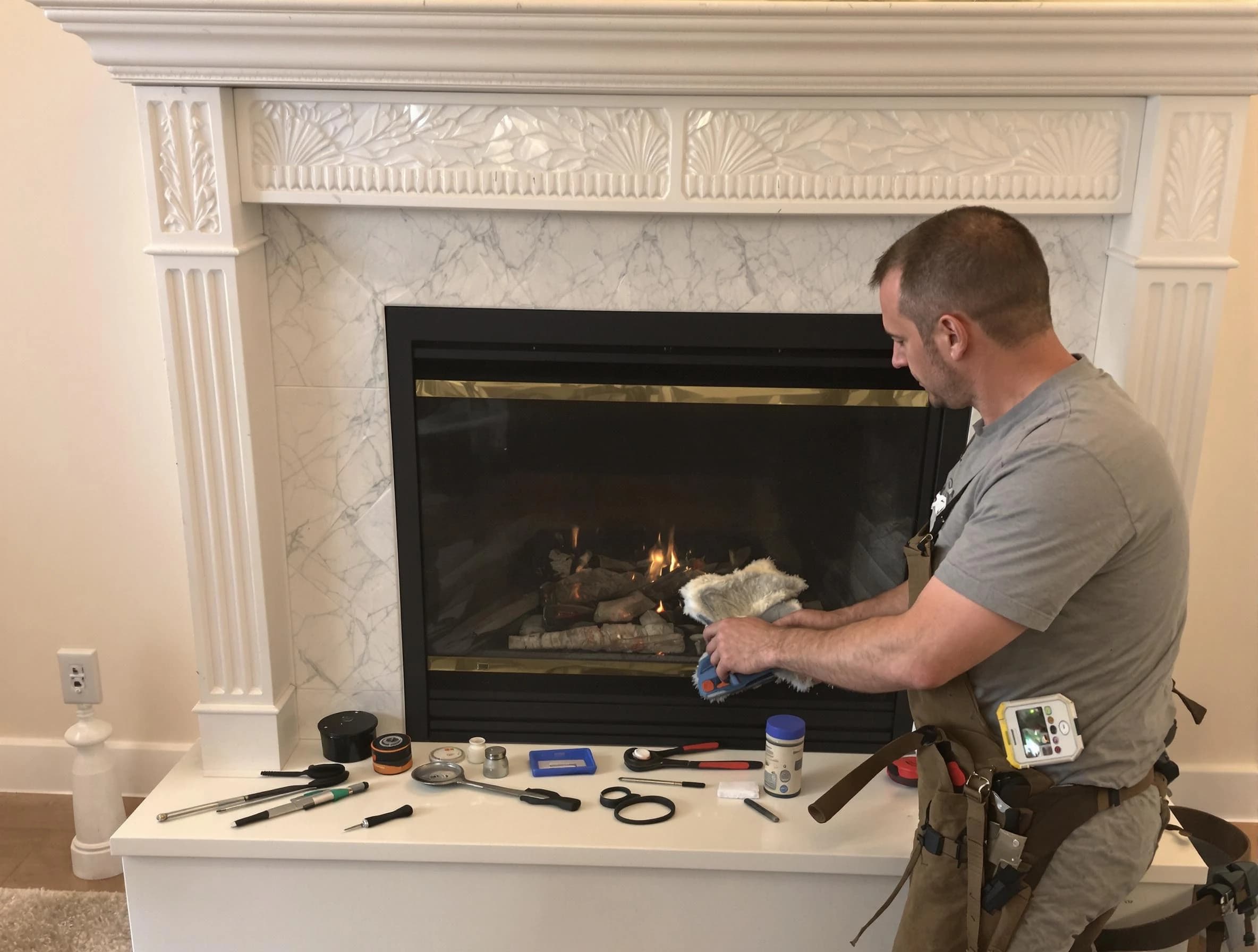 Queen Creek Chimney Sweep performing fireplace maintenance in Queen Creek, AZ